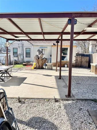 a view of a hall with a couch