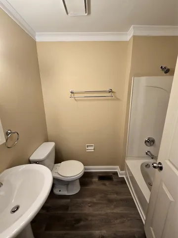 a bathroom with a sink and toilet