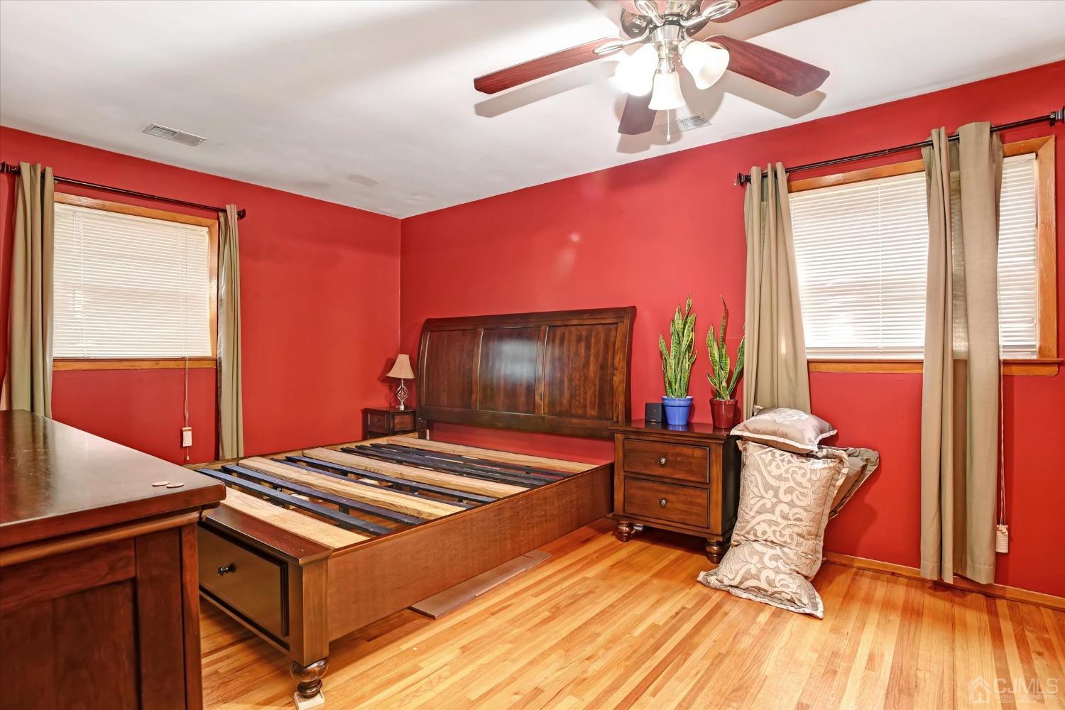 5 Weiss Drive Middlesex, NJ 08846 - Photo 12 of 24 a bedroom with furniture and a window