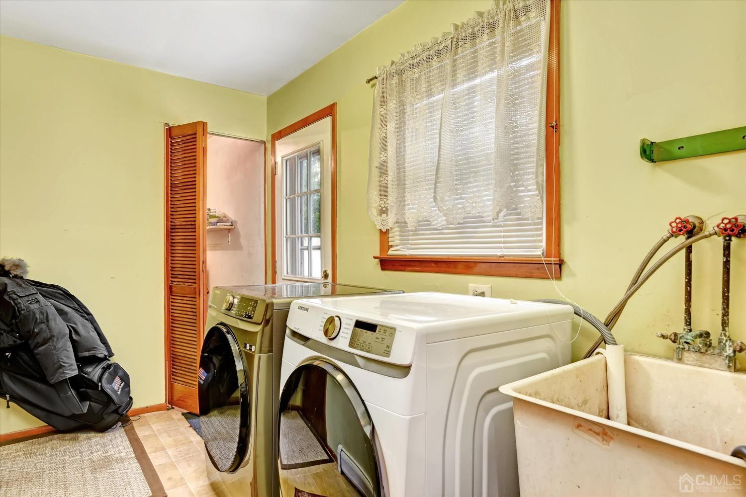 5 Weiss Drive Middlesex, NJ 08846 - Photo 17 of 24 a view of a kitchen with furniture and windows