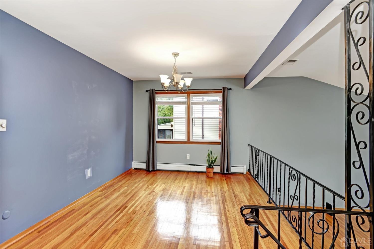 5 Weiss Drive Middlesex, NJ 08846 - Photo 5 of 24 a bedroom with a bed and a window