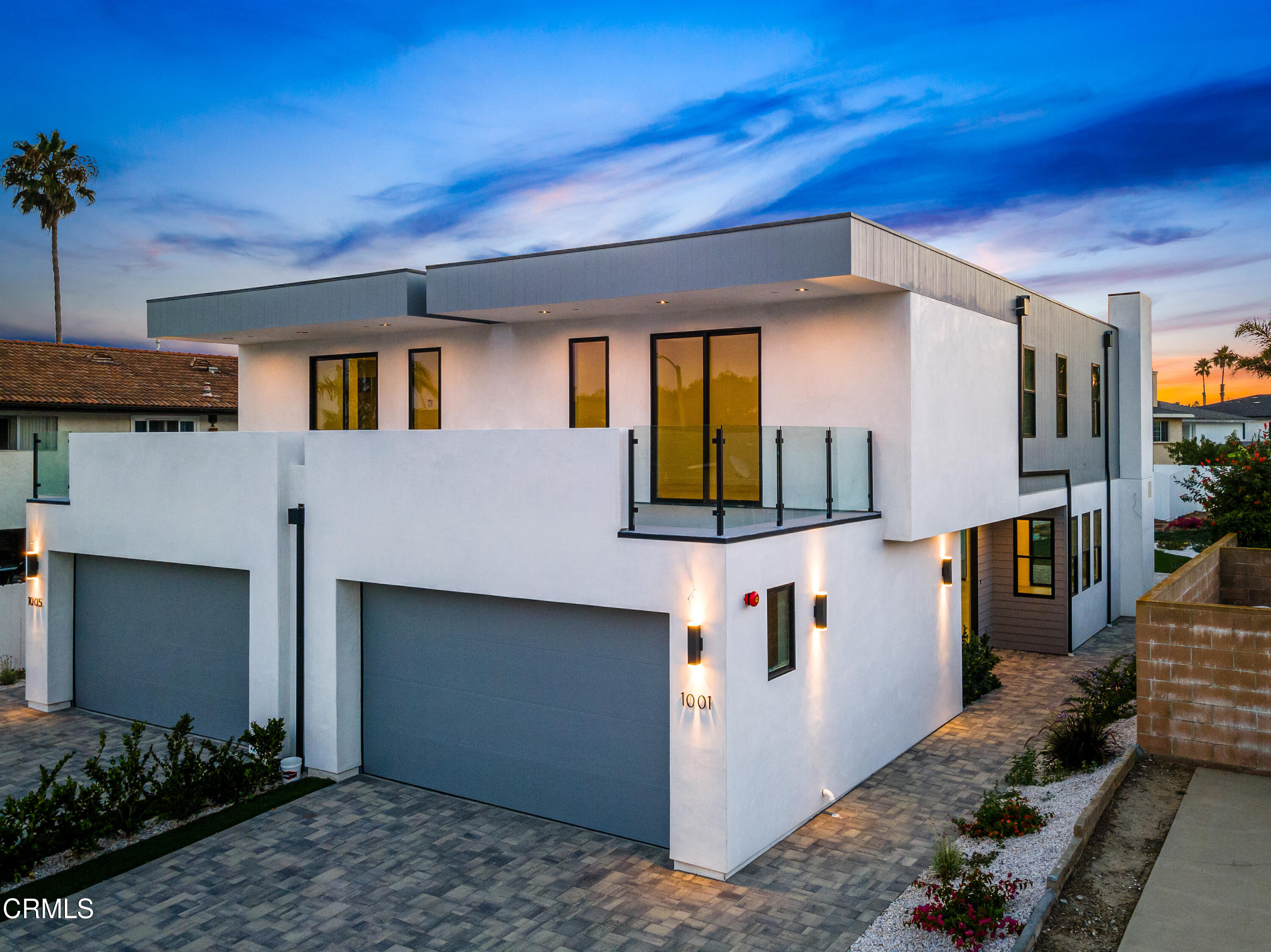 1001 Catamaran Street Oxnard, CA 93035 - Photo 3 of 37 a front view of a house with garden