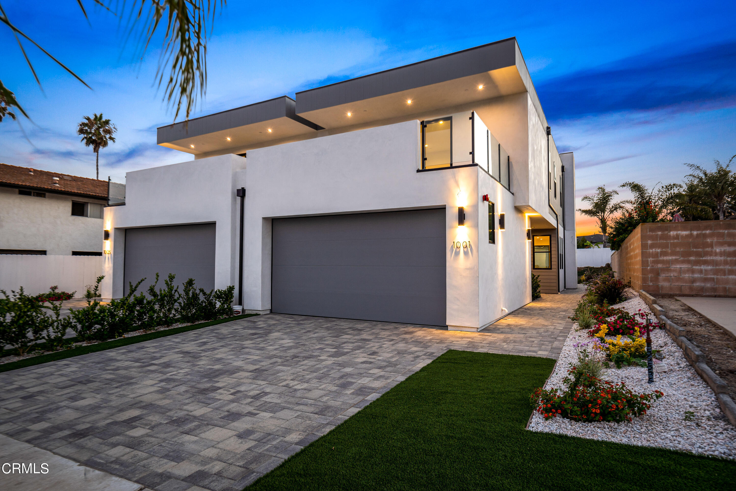 1001 Catamaran Street Oxnard, CA 93035 - Photo 6 of 37 a front view of a house with garden