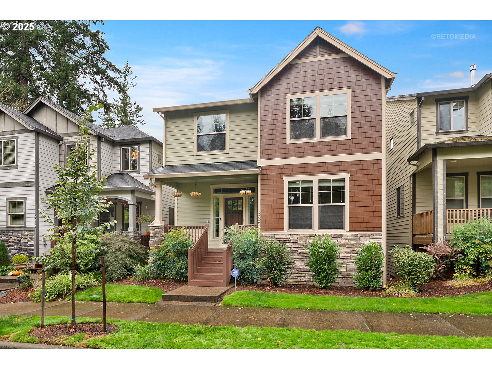 a front view of a house with a yard