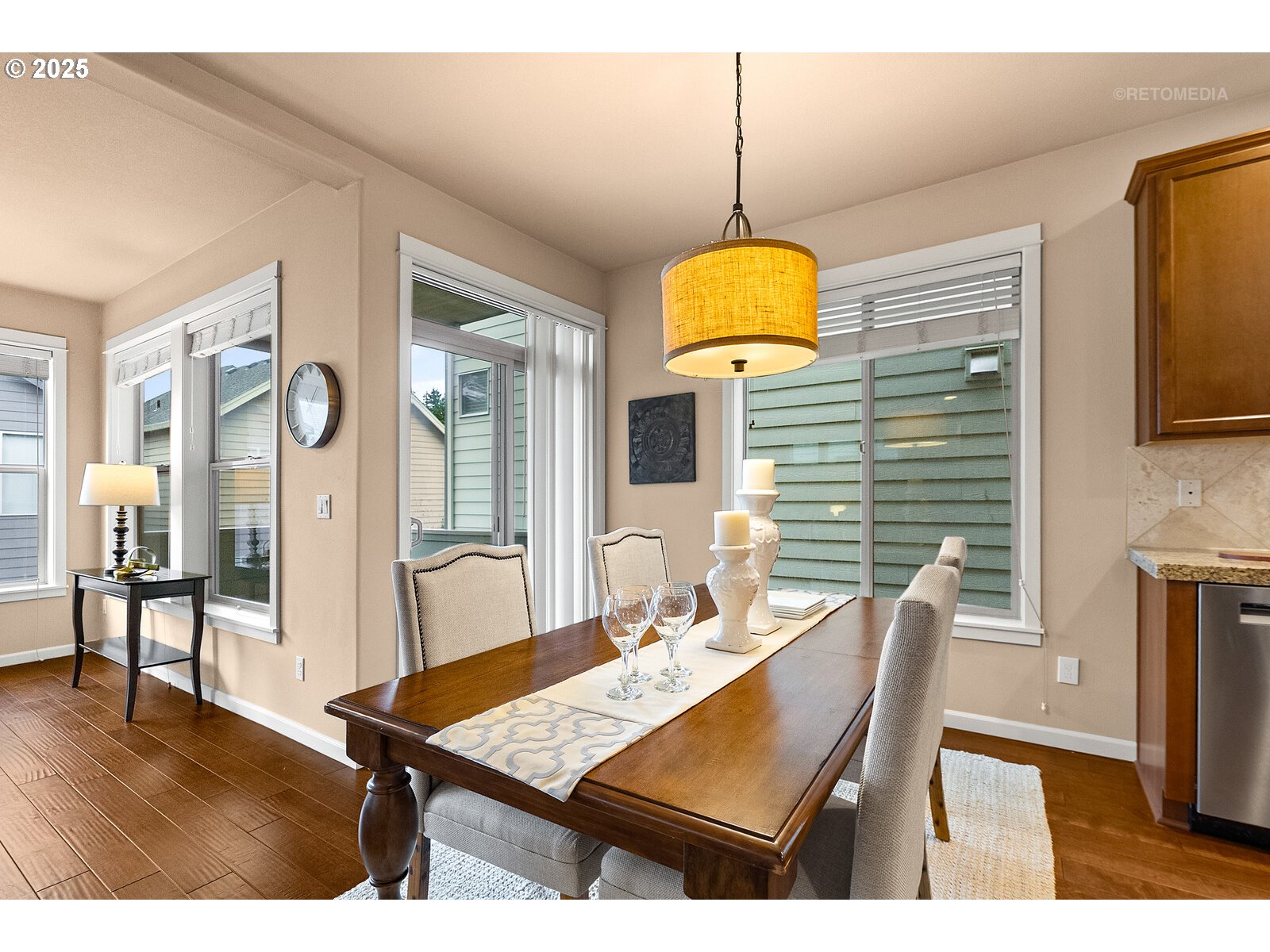 865 Southwest 90th Avenue Portland, OR 97225 - Photo 13 of 36 a view of a dining room with furniture wooden floor and chandelier