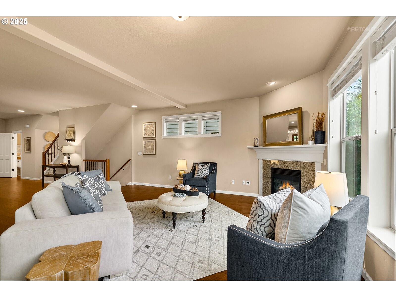 865 Southwest 90th Avenue Portland, OR 97225 - Photo 16 of 36 a living room with furniture a fireplace and a large window