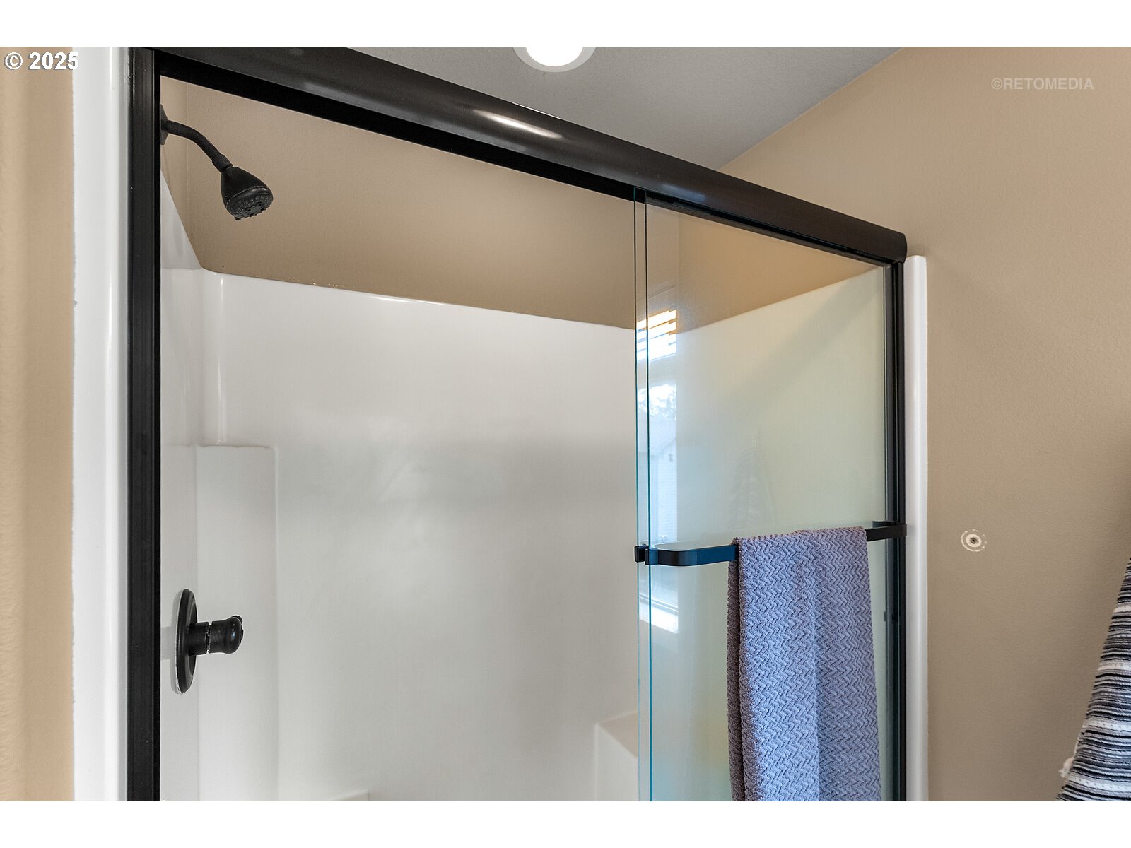 865 Southwest 90th Avenue Portland, OR 97225 - Photo 23 of 36 a bathroom with a shower and a mirror