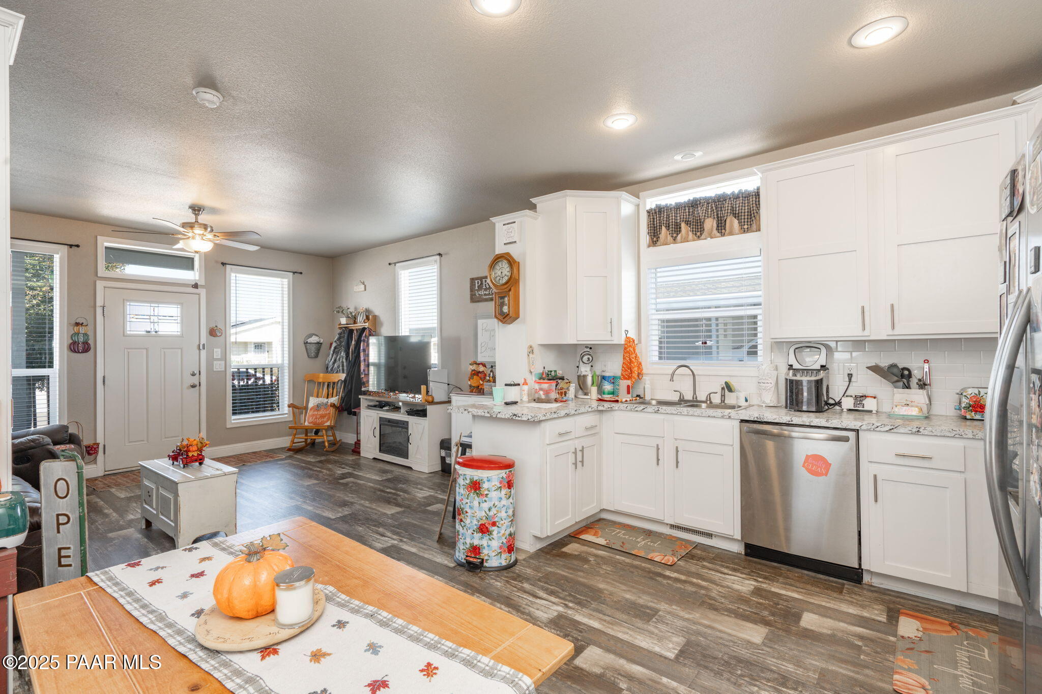 1023 Thorton Road Camp Verde, AZ 86322 - Photo 11 of 29 a kitchen that has a lot of cabinets a sink and appliances in it