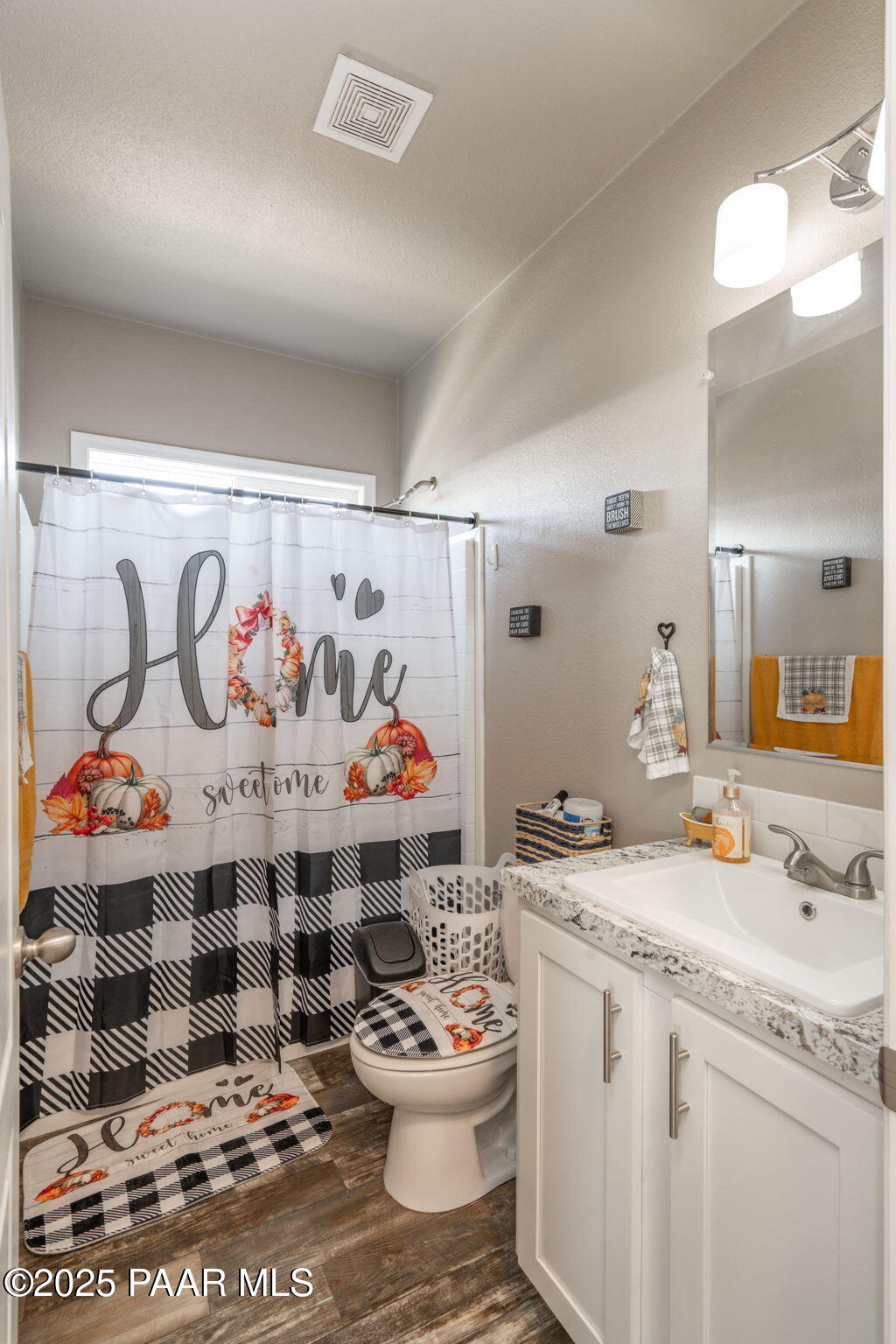 1023 Thorton Road Camp Verde, AZ 86322 - Photo 16 of 29 a bathroom with a sink a mirror and shower
