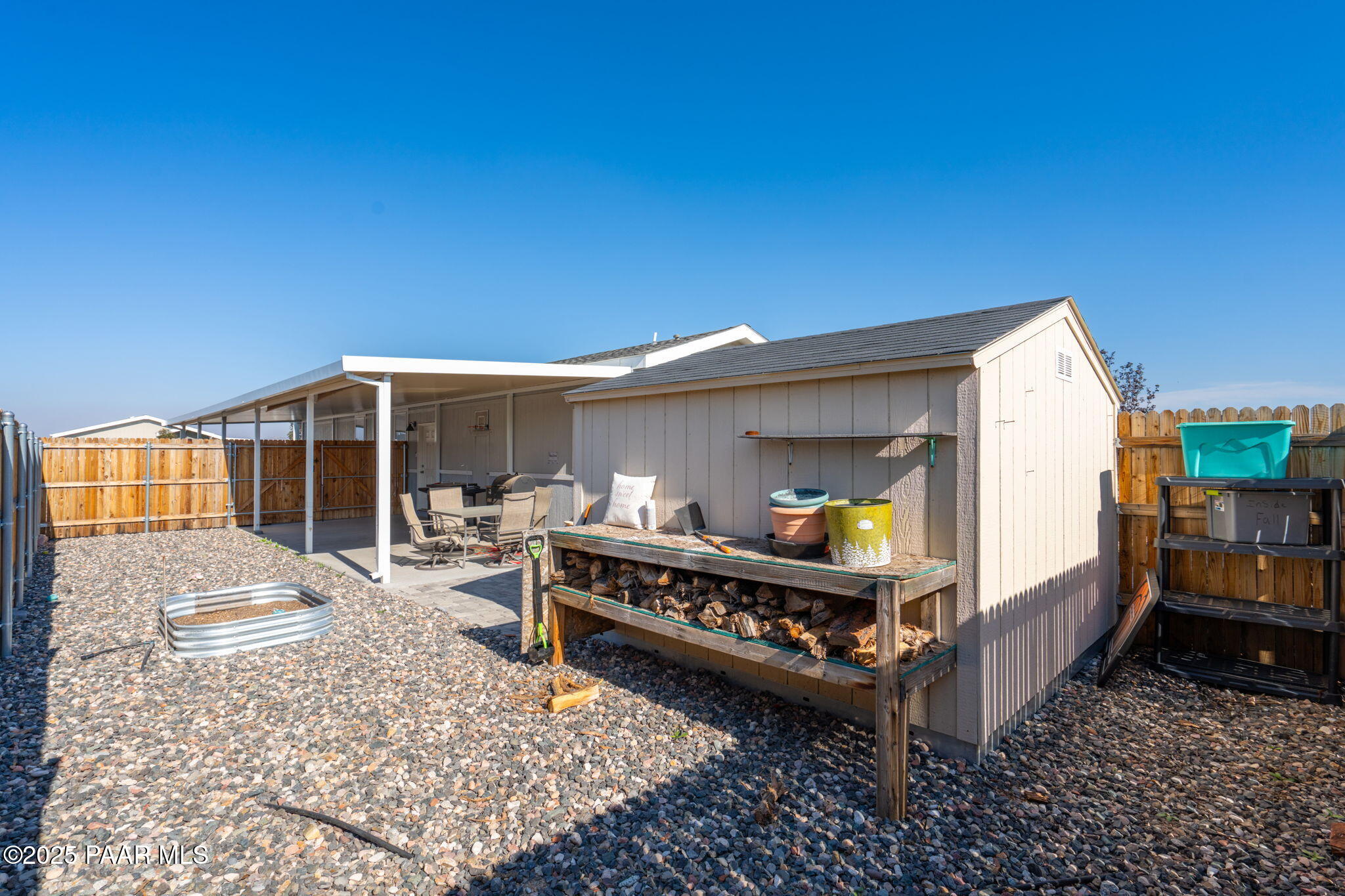 1023 Thorton Road Camp Verde, AZ 86322 - Photo 24 of 29 a view of a house with pool and chairs in patio