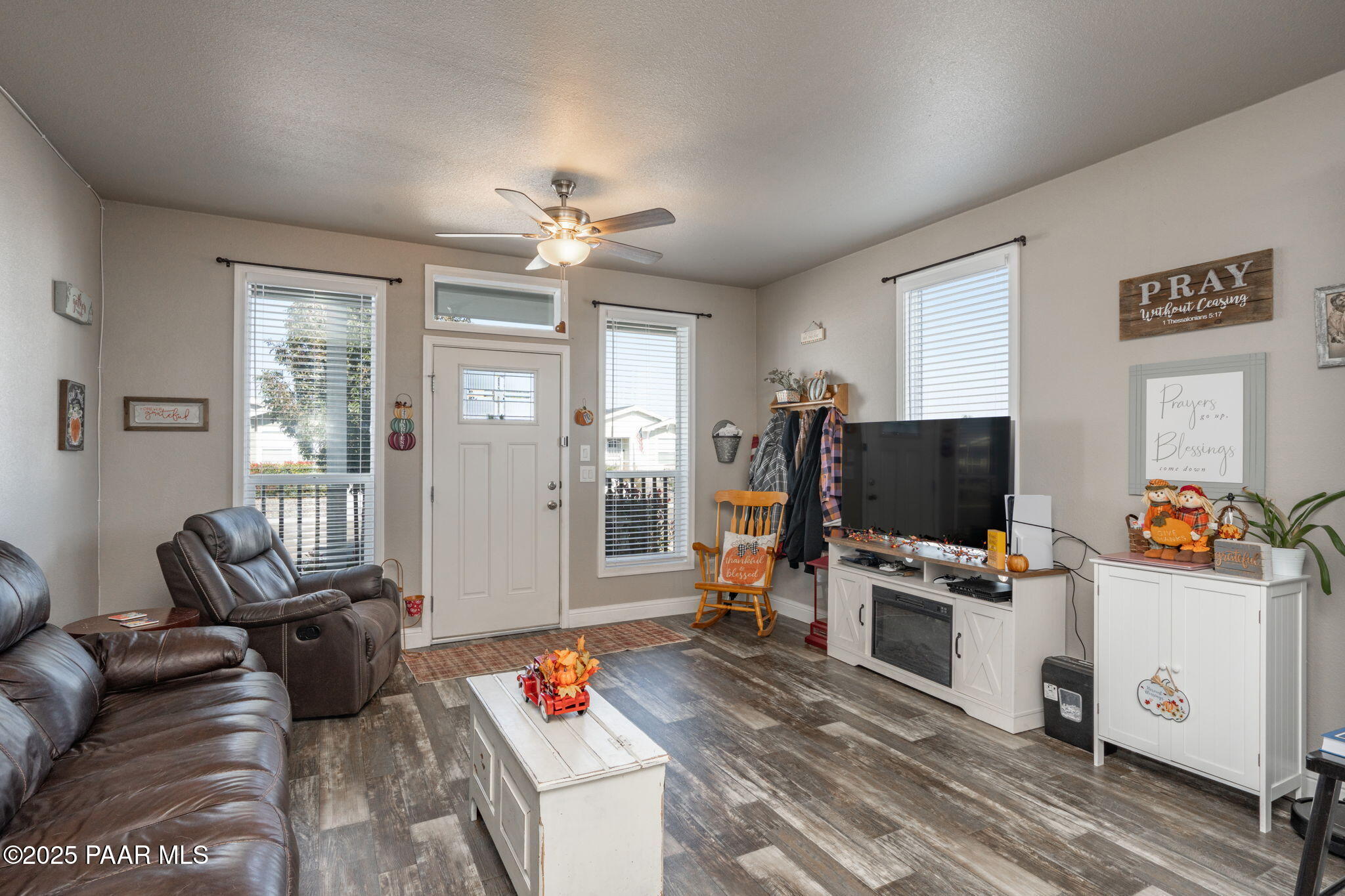 1023 Thorton Road Camp Verde, AZ 86322 - Photo 9 of 29 a living room with furniture and a flat screen tv