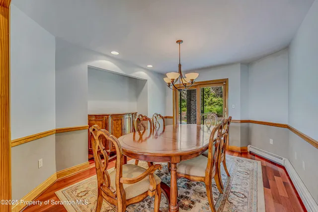 a bath tub sitting in front of a window