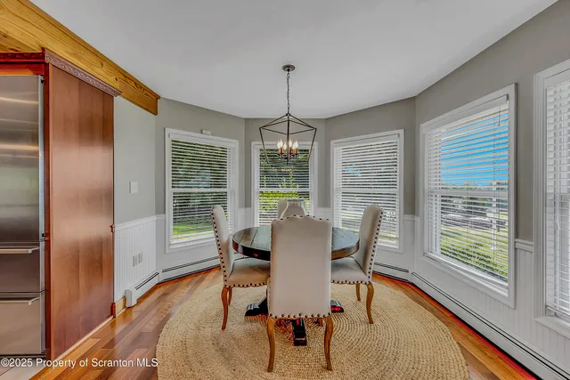 a view of porch with wooden floor and stairs