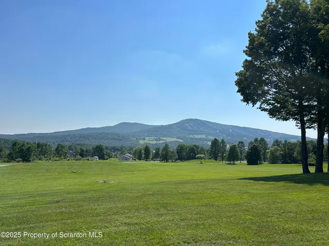 a view of a mountain with a outdoor space