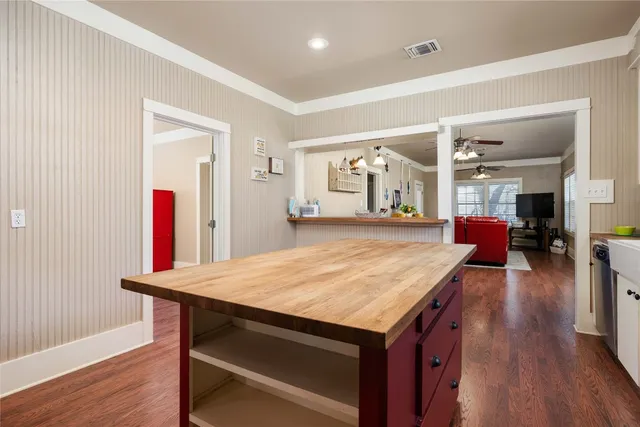 a view of a house with backyard porch and sitting area