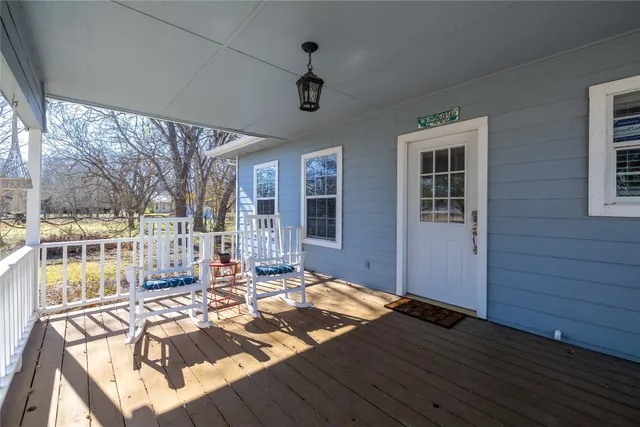 a view of a living room and hardwood floor