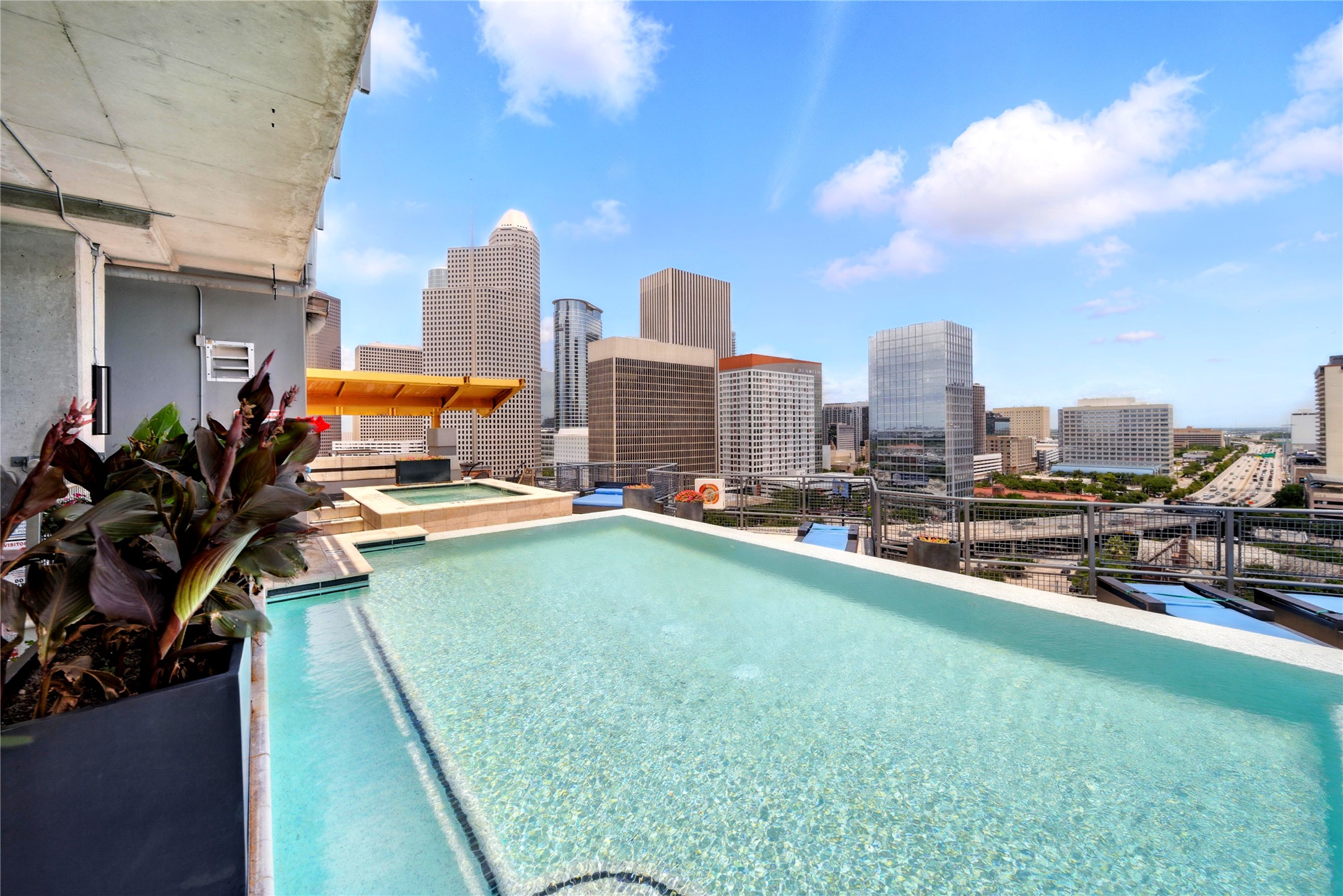 2000 Bagby Street, Unit 5423 Houston, TX 77002 - Photo 20 of 26 a view of a swimming pool from a balcony