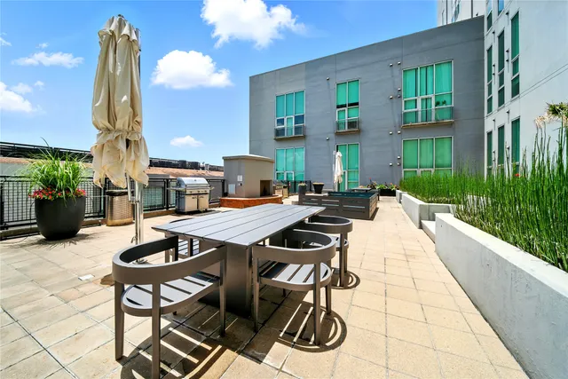 a view of a terrace with sitting area