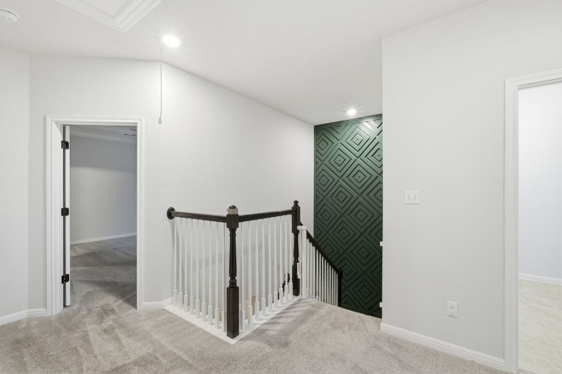 1941 Winston Way Leander, TX 78641 - Photo 12 of 28 Hall featuring an upstairs landing, light colored carpet, and recessed lighting