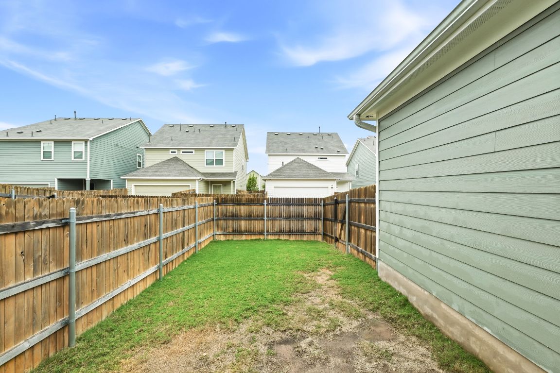 1941 Winston Way Leander, TX 78641 - Photo 23 of 28 Fenced backyard featuring a residential view
