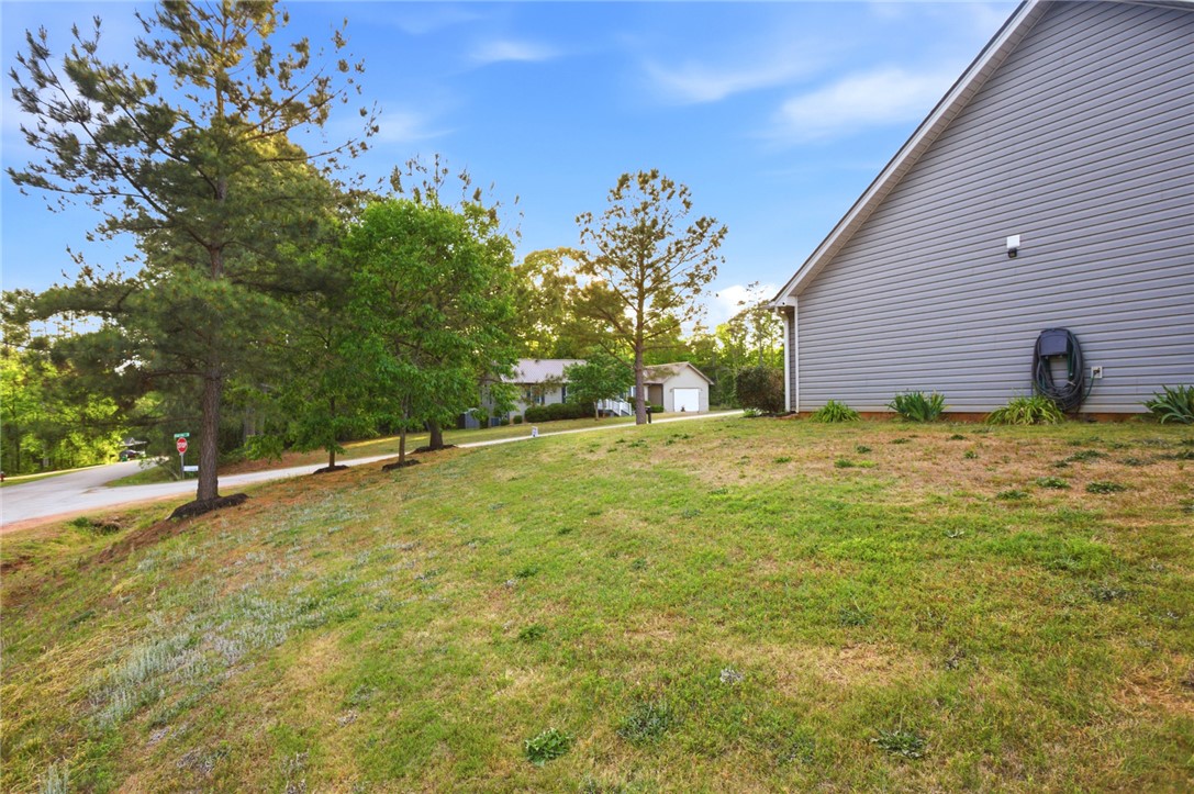 400 Green View Court Westminster, SC 29693 - Photo 33 of 33 This property features a spacious yard with mature trees, offering a serene outdoor environment.
