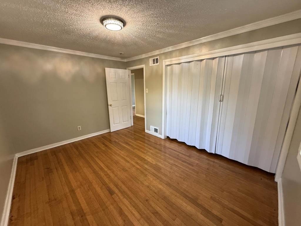1232 South White Station Road Memphis, TN 38117 - Photo 12 of 21 a view of a room with wooden floor