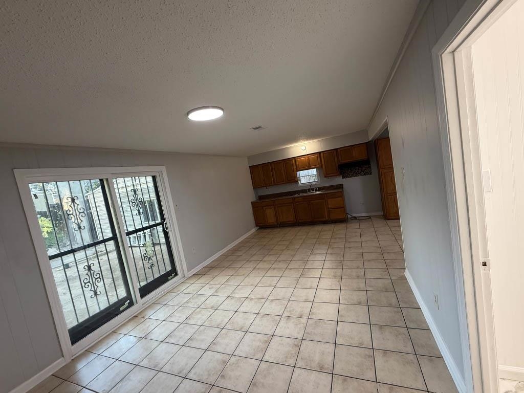 1232 South White Station Road Memphis, TN 38117 - Photo 19 of 21 a view of empty room with windows