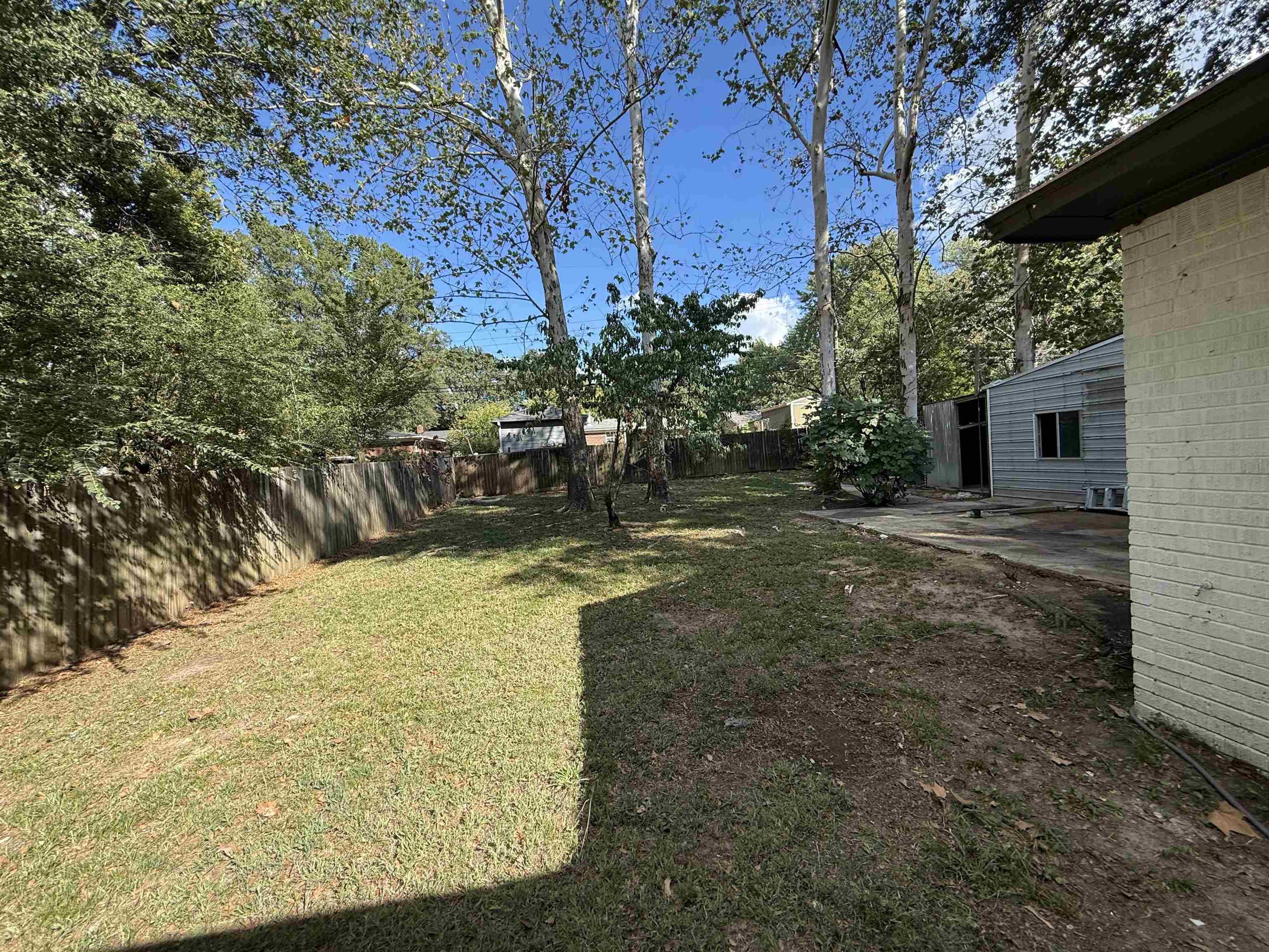 1232 South White Station Road Memphis, TN 38117 - Photo 21 of 21 a view of a yard with an outdoor space