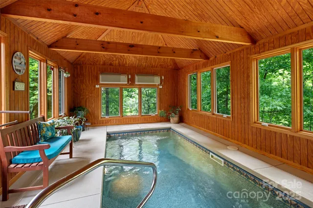 a room with furniture and a large window