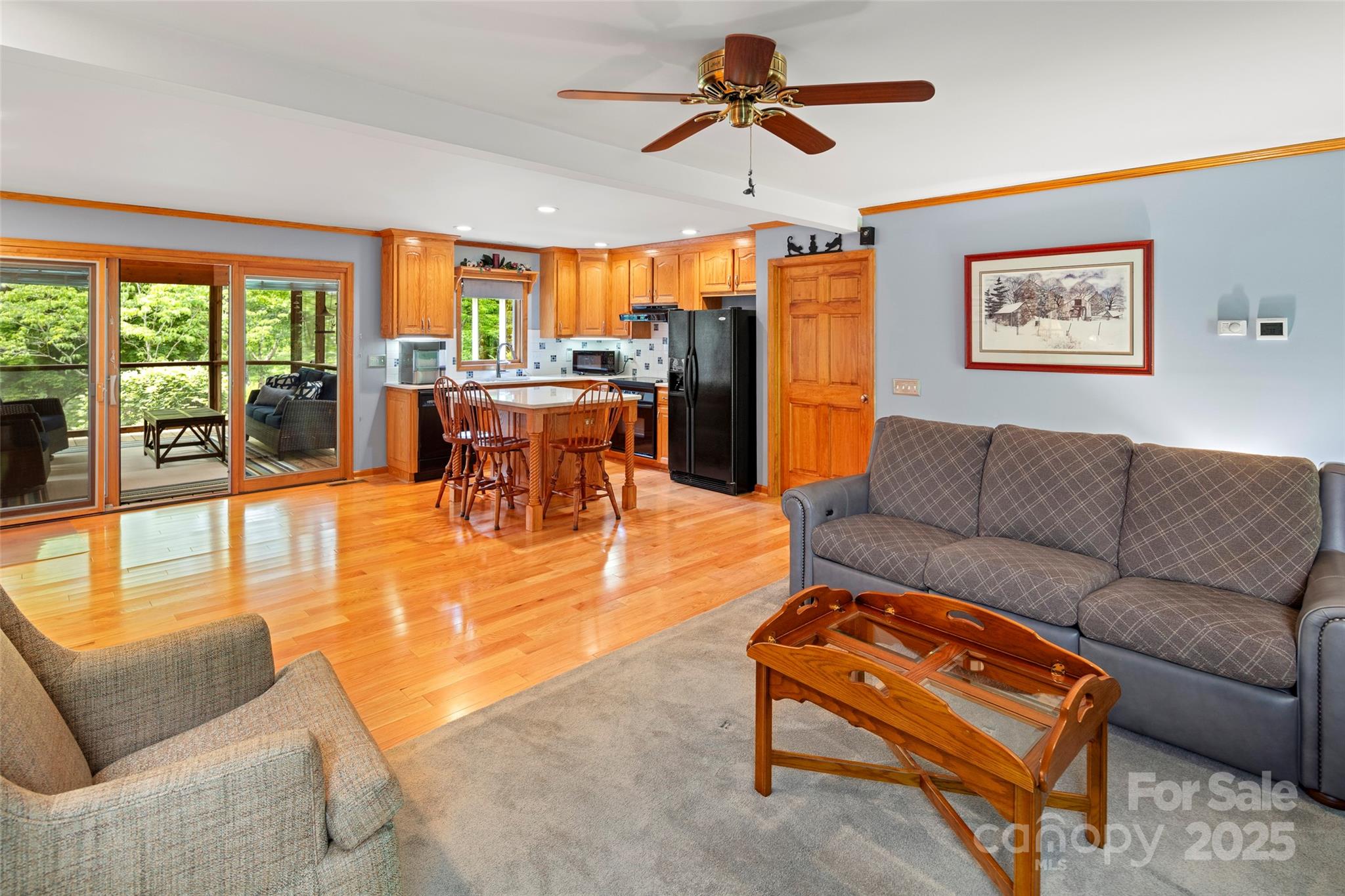 421 North Boundary Road Mill Spring, NC 28756 - Photo 23 of 43 a living room with furniture and a large window