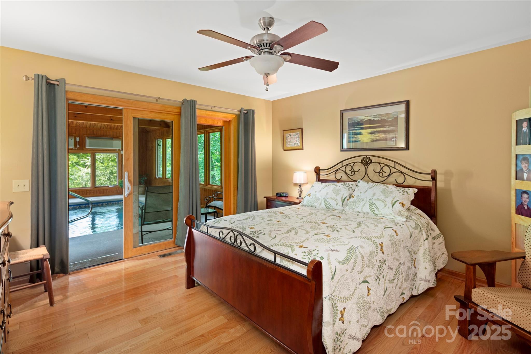 421 North Boundary Road Mill Spring, NC 28756 - Photo 26 of 43 a bedroom with bed and window