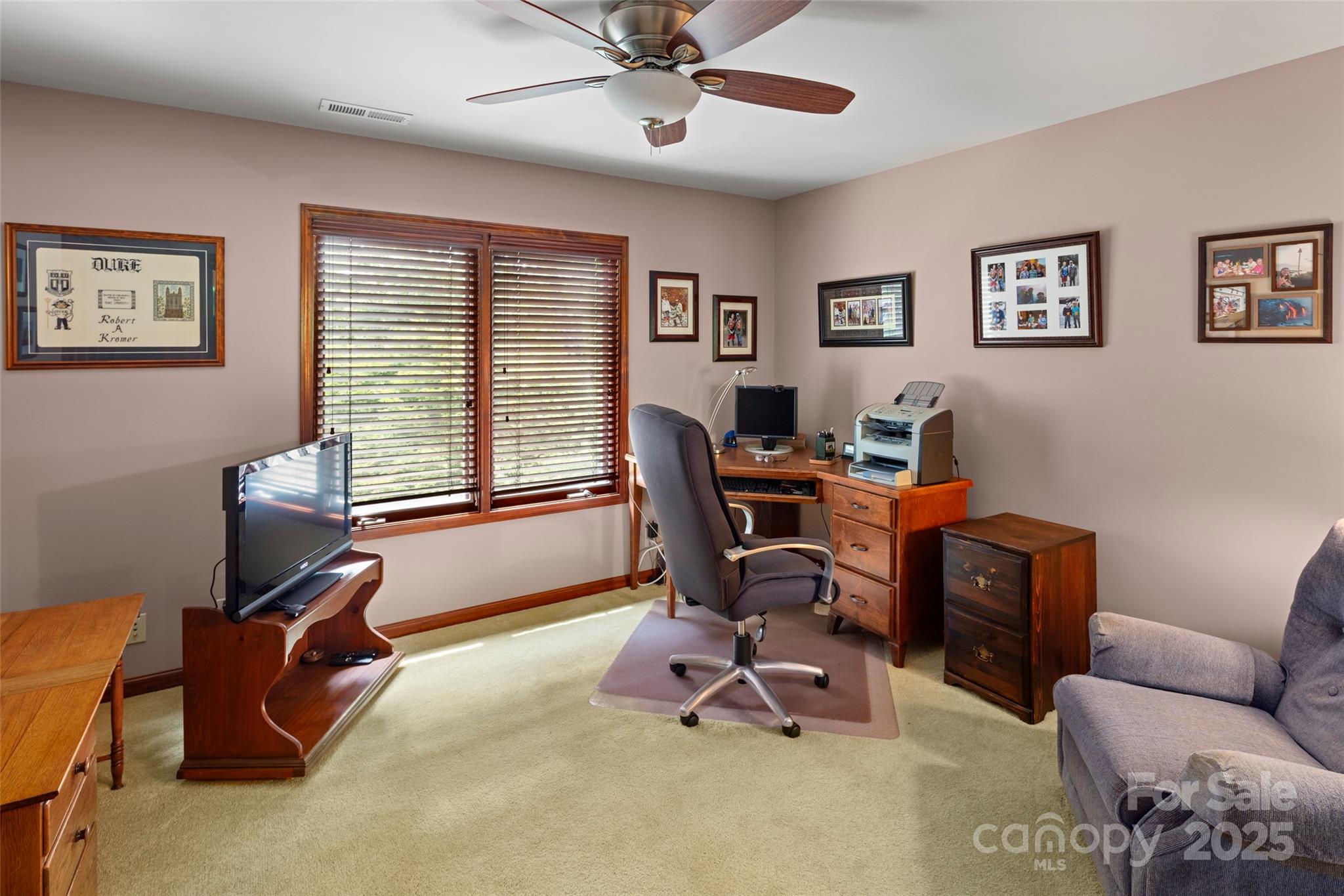 421 North Boundary Road Mill Spring, NC 28756 - Photo 30 of 43 a view of a livingroom with workspace and a couch
