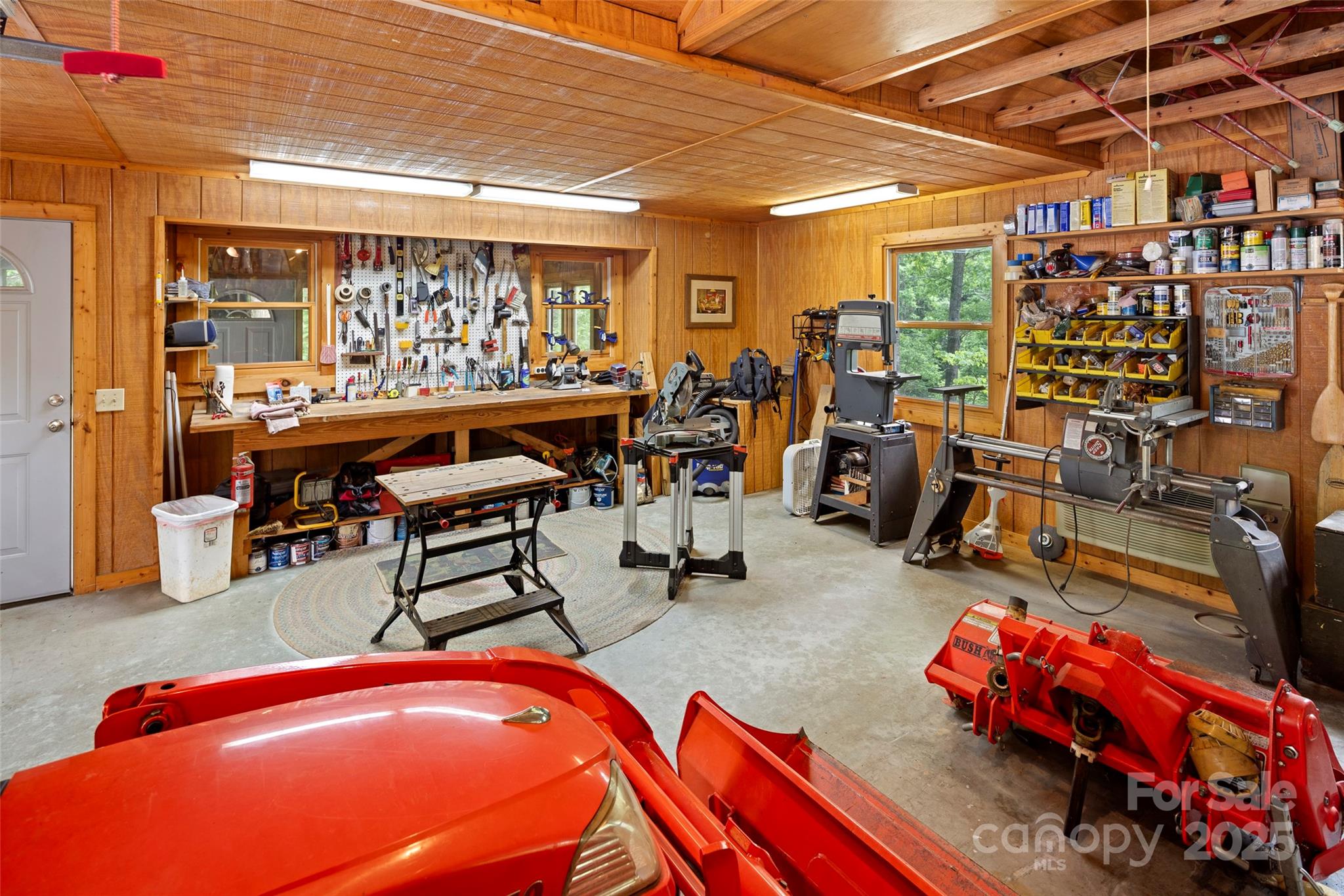 421 North Boundary Road Mill Spring, NC 28756 - Photo 36 of 43 a room with lots of furniture and white walls