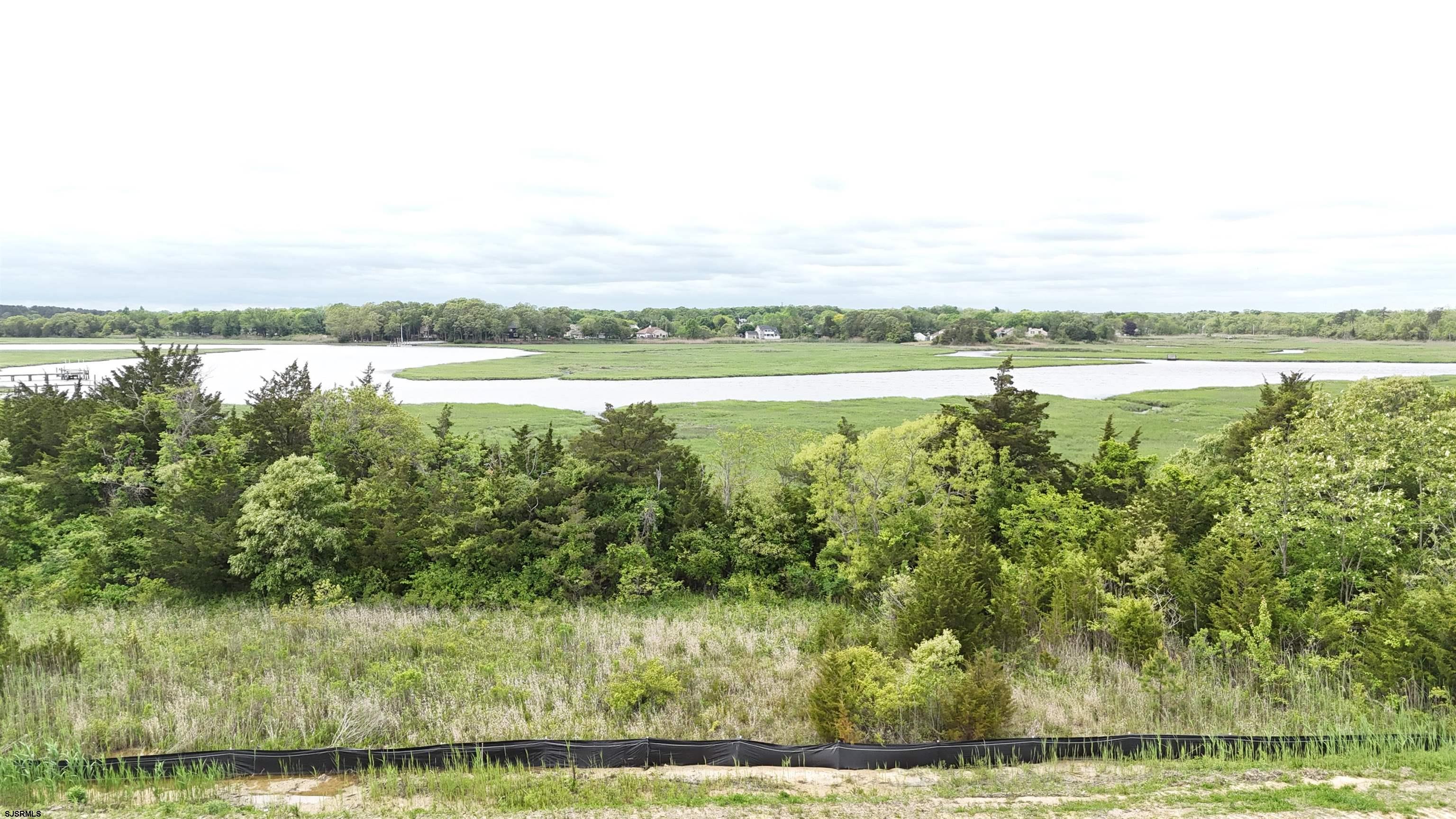 35 Creek Lane Linwood, NJ 08221 - Photo 5 of 7 a view of a lake view