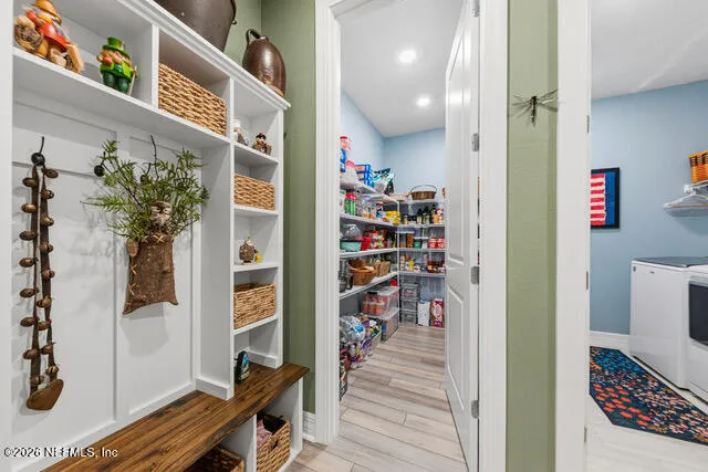 a view of a backyard with large trees