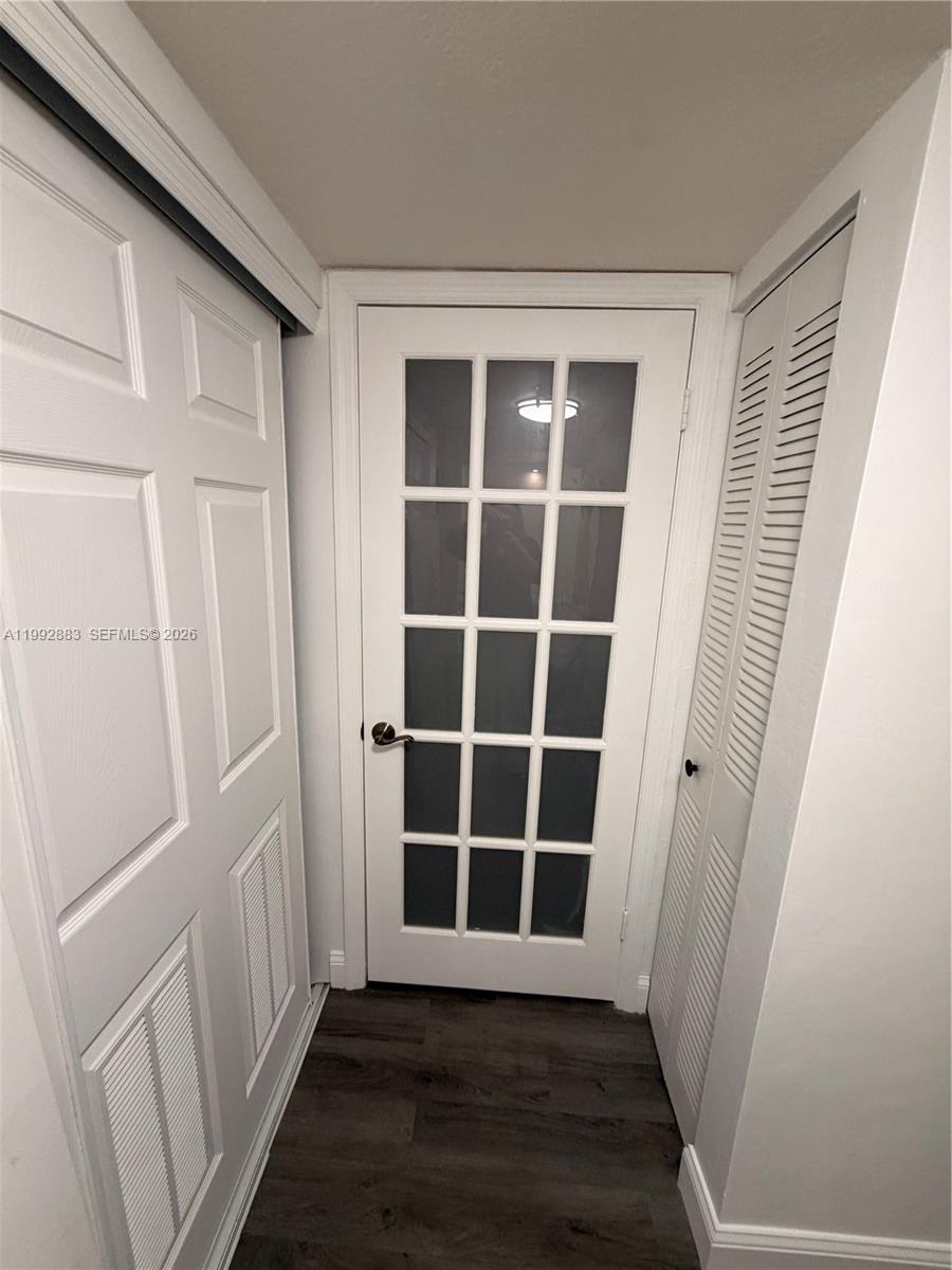 5800 Southwest 127th Avenue, Unit 2120 Miami, FL 33183 - Photo 29 of 53 2nd Bedroom entry french doors