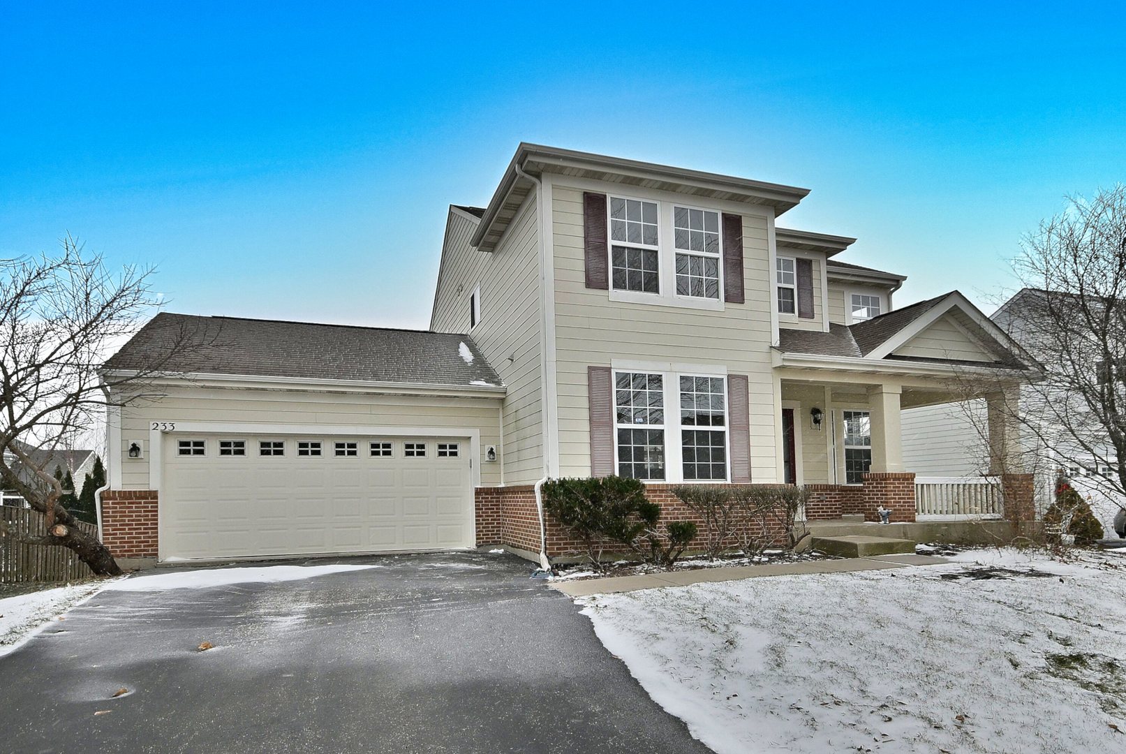 233 Pawtucket Avenue Elgin, IL 60124 - Photo 2 of 49 a front view of a house with a yard
