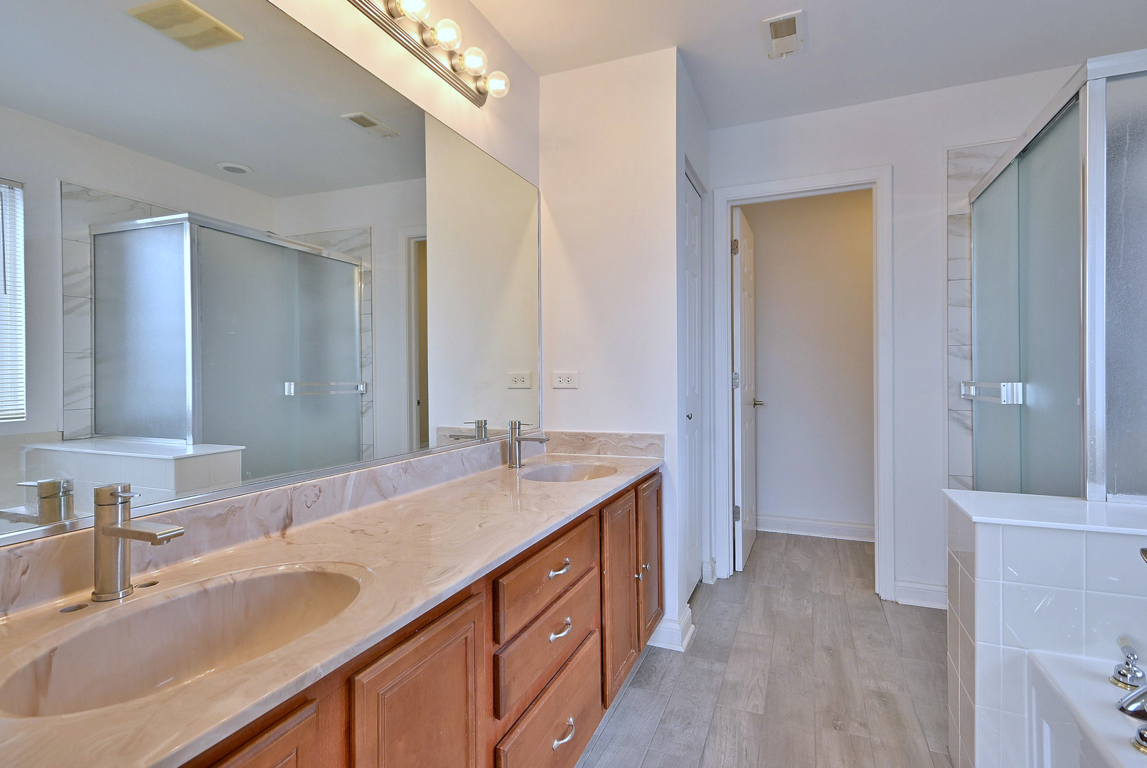 233 Pawtucket Avenue Elgin, IL 60124 - Photo 28 of 49 a bathroom with a granite countertop sink and a mirror