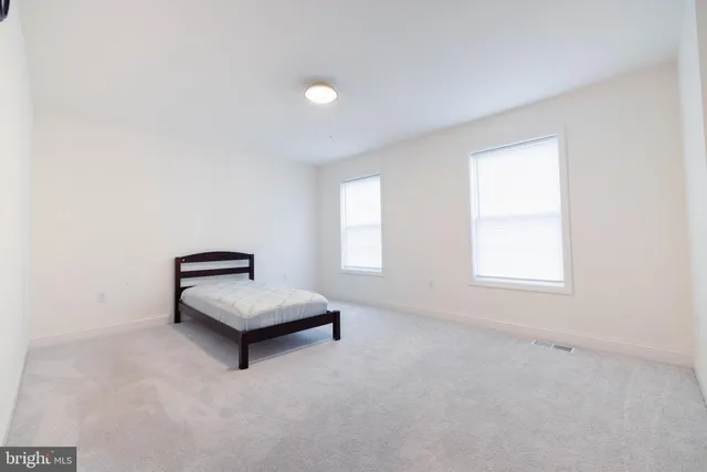 an living room with furniture and a window