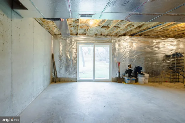 a view of a balcony with wooden floor and fence