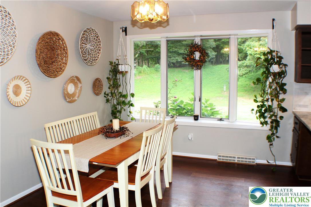 909 Wood Road Danielsville, PA 18038 - Photo 20 of 56 a dining room with furniture and a large window