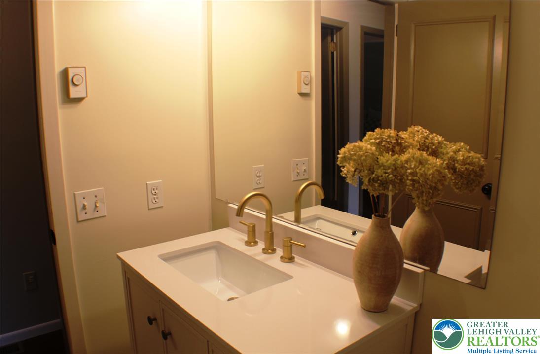 909 Wood Road Danielsville, PA 18038 - Photo 42 of 56 a bathroom with a sink toilet and shower