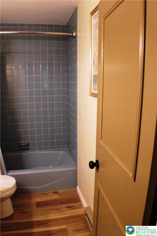 909 Wood Road Danielsville, PA 18038 - Photo 44 of 56 a bathroom with a bathtub and a shower