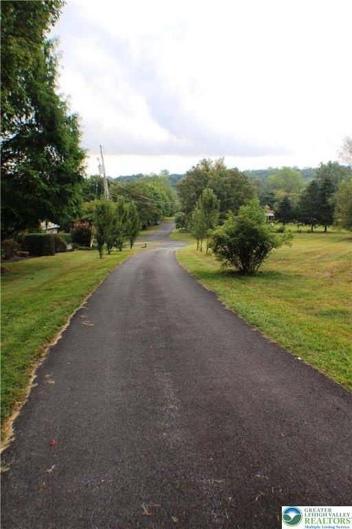909 Wood Road Danielsville, PA 18038 - Photo 53 of 56 a view of a field with an trees
