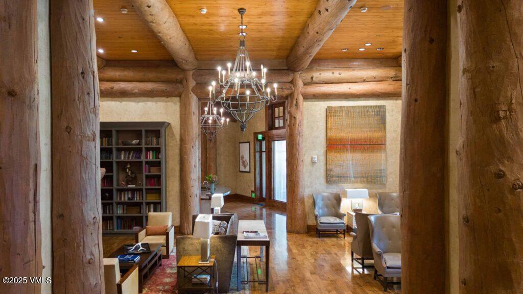 100 Bachelor Ridge Road, Unit 3506/09 Avon, CO 81620 - Photo 21 of 33 a view of a dining room with furniture and chandelier
