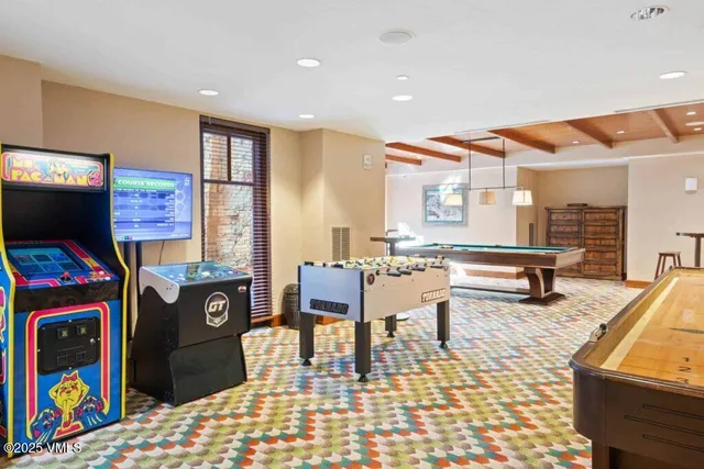 a living room with a couch and a table