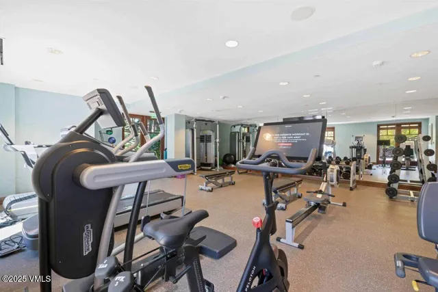 a view of a room with gym equipment