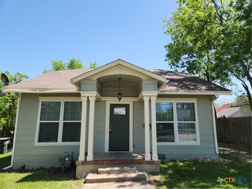 1505 North 7th Street Temple, TX 76501 - Photo 1 of 1 a front view of a house with a yard