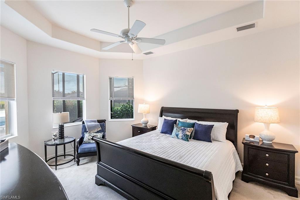 7863 Valencia Court Naples, FL 34113 - Photo 22 of 50 a bedroom with a bed and window