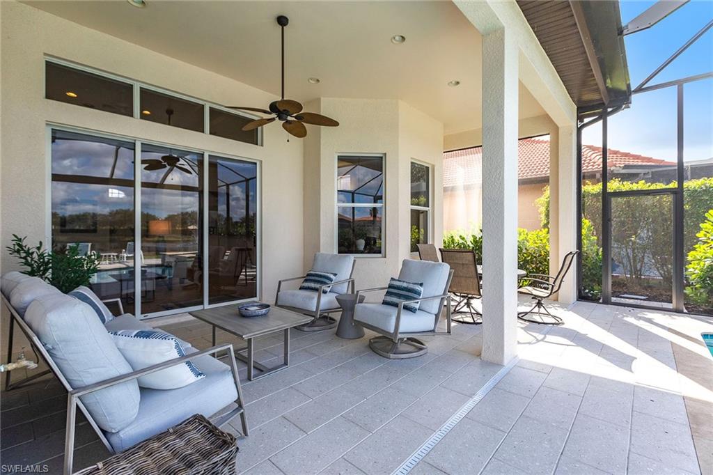 7863 Valencia Court Naples, FL 34113 - Photo 42 of 50 a living room with furniture